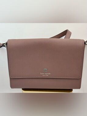 kate spade mauve crossbody with gold-tone logo